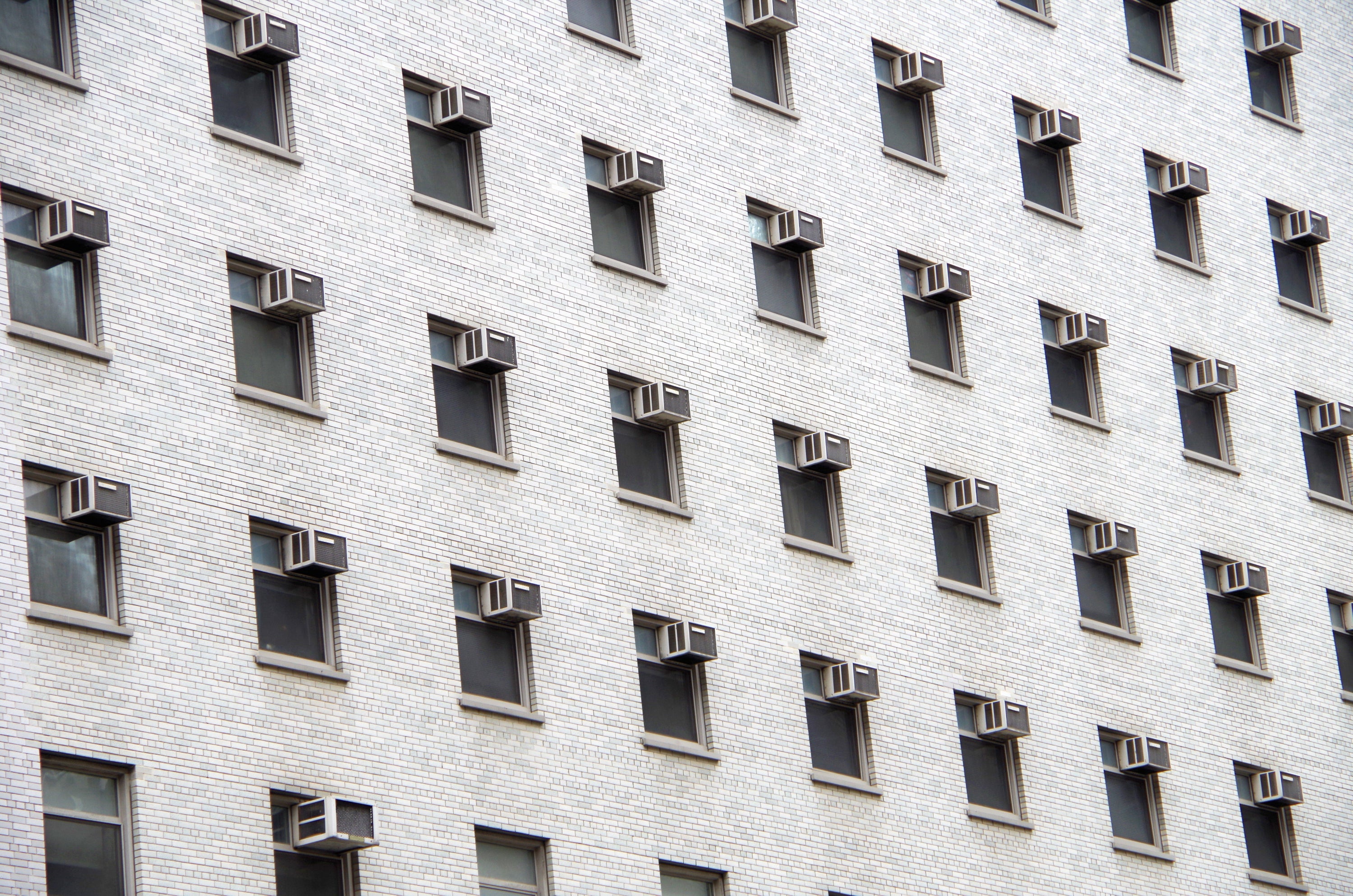 Pattern of air conditioning units on a building facade